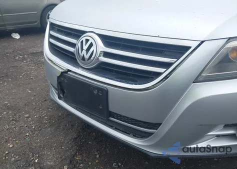 2011 Volkswagen Tiguan Sel z USA, uszkodzony, nr VIN WVGAV7AX1BW520990